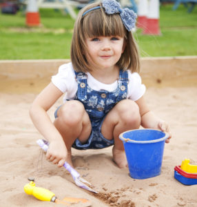 Bluebells Play Park - Girl Playing in the sandpit